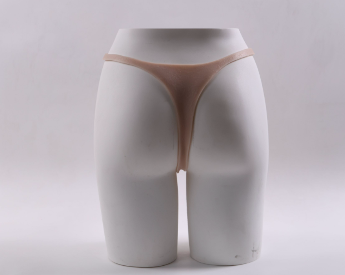 Little Cannon wearing a dildo