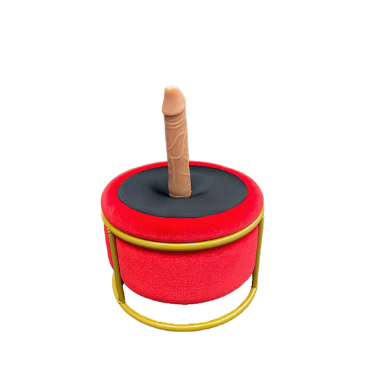 Red plug-in massage chair with dildo