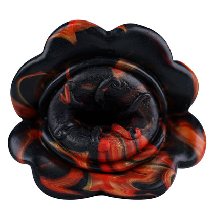 Alien-shaped male masturbator with simulated soft flesh.