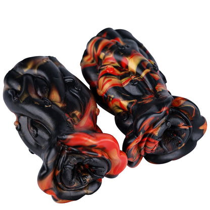 Alien-shaped male masturbator with simulated soft flesh.