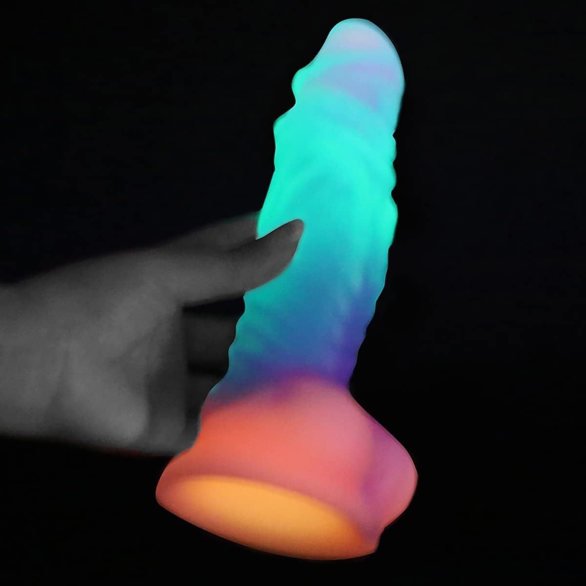 Luminous, irregularly shaped silicone massage stick/phallus