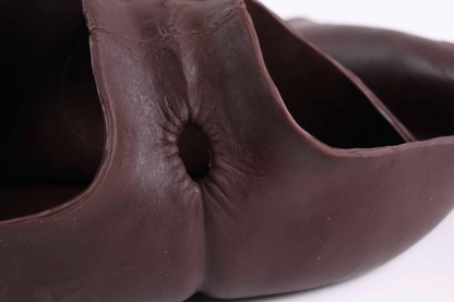 Wearing a silicone dildo