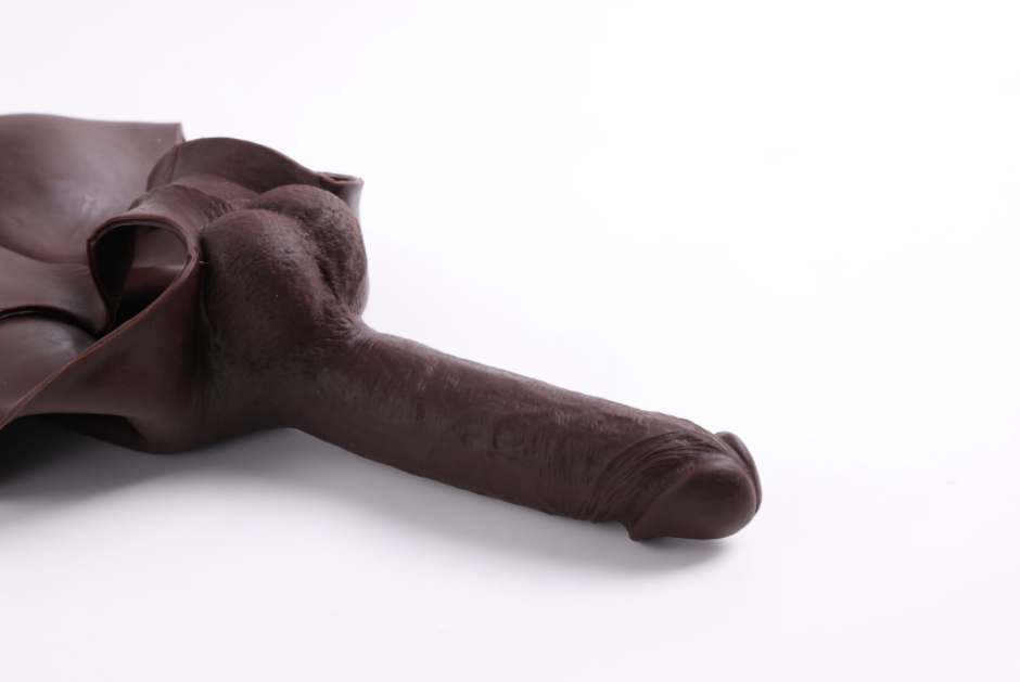 Wearing a silicone dildo