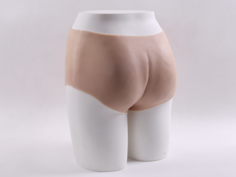 Wearing a silicone dildo