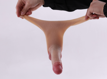 Little Cannon wearing a dildo