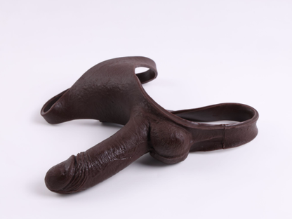 Little Cannon wearing a dildo