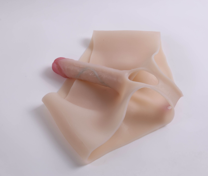 Mela (with cutouts) wearing a dildo