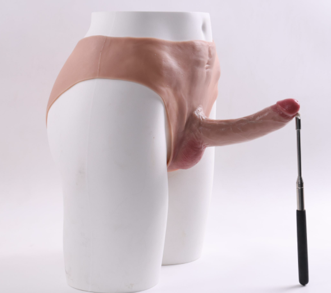 Scarface wearing a fake penis